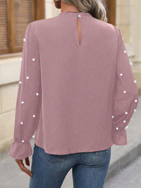Thumbnail for Blusa Elegante Rosa con Mangas de Campana y Detalles de Perlas