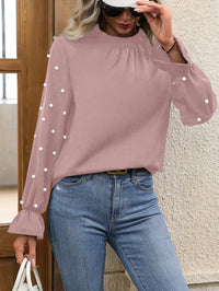 Thumbnail for Blusa Elegante Rosa con Mangas de Campana y Detalles de Perlas